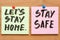 Stay at home and be safe. Self isolation and quarantine campaign to protect yourself and save lives. Handwritten