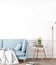 Stay home Cozy Interior Mock up With white empty wall in Living Room, Scandinavian Style, blue sofa with white plaid.