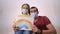 stay home. dad daughter holding a rainbow drawing self-isolation. pandemic coronavirus quarantine concept. dad daughter