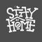 Stay Home typography. Lettering with birdhouse on dark gray background. Monochrome vector illustration with bold white