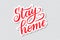 Stay home vector lettering on white sticker