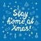 Stay home at xmas, white handwritten lettering on blue background