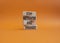 Stay Motivated and Engaged symbol. Concept words Stay Motivated and Engaged on wooden blocks. Beautiful orange background.