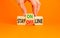 Stay online or offline symbol. Concept word Stay online or offline on wooden cubes. Businessman hand. Beautiful orange table