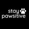 Stay pawsitive text with paw illustration