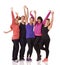 Staying fit is a group effort here. A group of excited women of different body shapes standing isolated on white while