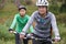 Staying fit together. Two young cyclists enjoying their ride along a trail.
