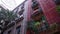 Steadicam shot: house exterior with balconies in Barcelona Gothic Quarter. Facades of medieval apartment buildings in