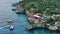 steady aerial landscape video view along the area around famous Rick\'s Cafe in Negril,