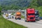 A steady flow of semis lead the way down a busy interstate highway in Tennessee