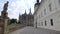 Steadycam shot in street in Kutna Hora town in summertime, Barbara church is in front