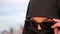 Steadycam - Woman with chador, hijab wearing sunglasses, istanbul