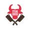 Steak house. Bull head silhouette and crossed meat cleavers. Design element for logo, label, emblem.