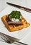 Steak, poached egg and waffle with chimichurri
