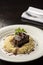 Steak sirloin tenderloin with wine sauce and risotto on plate