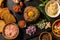 Steak tartar with chopped onion and herbs on a black slate board.Traditional homemade French steak tartare of raw beef