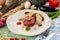 Steak Tartare with bread toasts and egg on blue wooden table