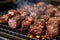 steak tips on bbq grill with garlic-infused smoke filling the air