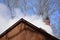 Steam billowing from a maple syrup sugar shack