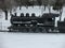 Steam engine covered in snow