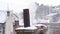 Steam heating pipe roof house winter morning pollution smoke chimney snow sky warm fire