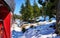 Steam locomotive drives through a forest with snow in winter. Dynamics through motion blur