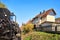 Steam locomotive drives past a half-timbered house in the city of Wernigerode. Dynamic due to motion blur