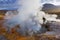 Steam of one of the beautiful El Tatio geysers at sunrise, Chile.