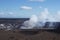 Steam plume rising from active volcano