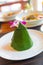 Steam Rice Wrapped In Cone Shape Banana Leaf With Orchid