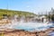 Steam Rises From Cistern Spring at Norris Geyser Basin in Yellowstone National Park