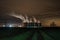 The Steam Rises From The Cooling Towers At Night