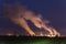 The Steam Rises From The Cooling Towers At Night