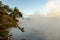 Steam rising from boiling mineral lake, Rotorua, New Zealand