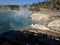 Steam rising from hot spring in crater Yellowstone National Park