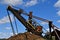 Steam shovel with gears and chains