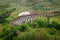 Steam train on a famous Glenfinnan viaduct, Scotland