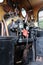 Steam train footplate showing gauges.