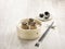 Steamed Beef Dumpling with Truffle served in a wooden bowl side view on grey marble background