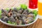 Steamed blanched clams with dipping sauce