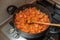 Steamed carrots in a pot