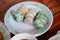 Steamed chives dumplings or Kanom Kuicheai on a plate for Chinese new year.