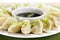 Steamed dumplings and soy sauce