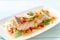 Steamed Grouper Fish Fillet with Chili Lime Sauce in lime dressing