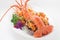 Steamed lobster in vegetable decorations