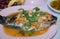 Steamed Nilotica fish,thai style steamed fish in spicy sauce.