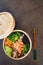 Steamed salmon with vegetables in a bamboo basket