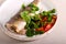 Steamed Seabass fish with salad served