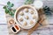 Steamed xiaolongbao served in a traditional steaming basket Top view