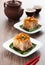 Steamed Yam Cake with Ground Deep-Fried Dried Shrimps Toppings. Chinese Cuisine